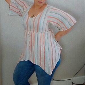 Torrid Candy striped blouse with 3/4 flared sleeves. Adjustable